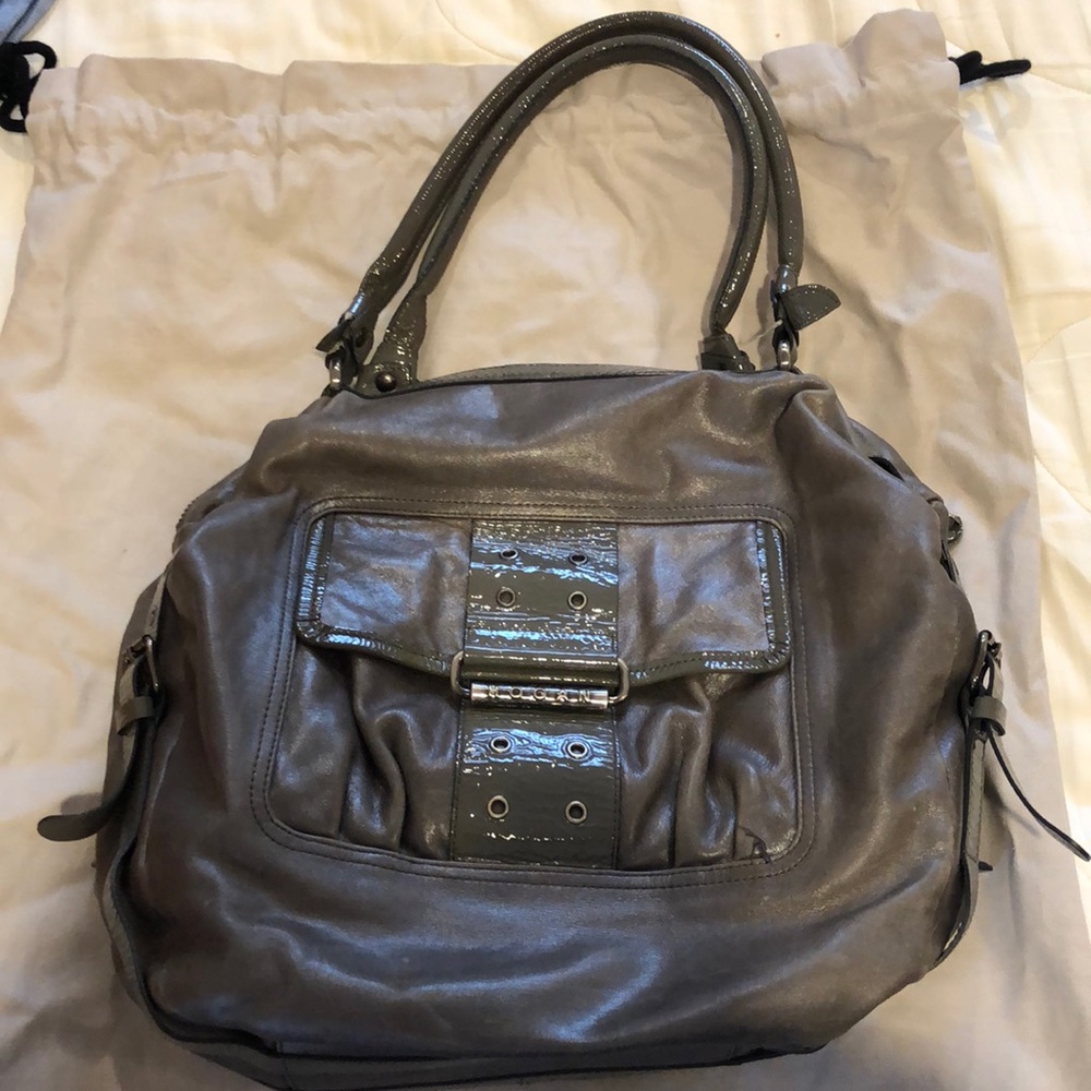 Leather Hogan gray purse in very good condition